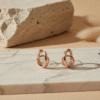 Rose Gold Intertwined Modern Huggie Hoops