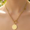 Golden Medallion Toggle Pendant Necklace by Yugmani