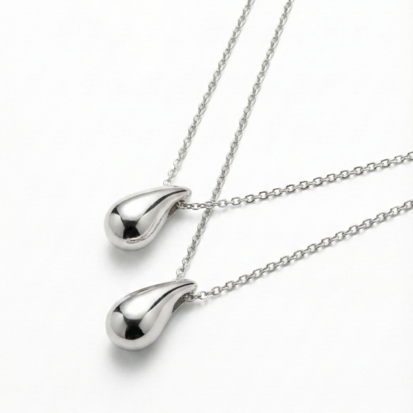 Sleek Silver Liquid Drop Pendant Necklace by Yugmani