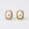 Classic Pearl-Glow Stud Earrings by Yugmani